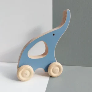 éléphant bleu en bois avec des roulettes à pousser et à tirer